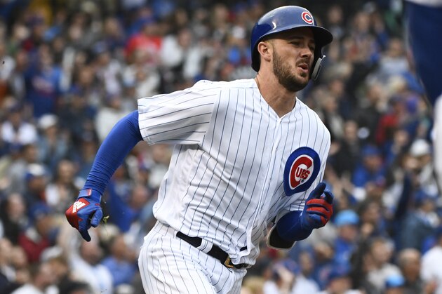 Chicago Cubs' Kris Bryant (17) runs the bases after he hit a two RBI double during the fifth inning of a baseball game against the St. Louis Cardinals on Sunday, Sept. 30, 2018, in Chicago. (AP Photo/Matt Marton)