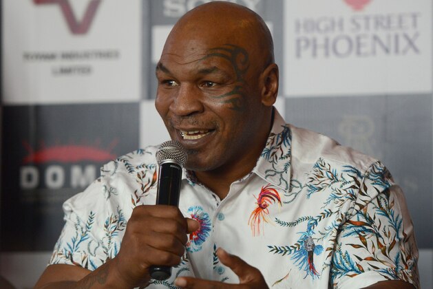 Former US boxer Mike Tyson speaks during a news conference to announce India's first global mixed martial arts Kumite 1 league in Mumbai on September 28, 2018. (Photo by PUNIT PARANJPE / AFP)        (Photo credit should read PUNIT PARANJPE/AFP/Getty Images)