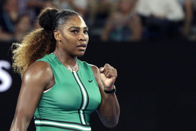 United States' Serena Williams celebrates after defeating Canada's Eugenie Bouchard in their second round match at the Australian Open tennis championships in Melbourne, Australia, Thursday, Jan. 17, 2019. (AP Photo/Aaron Favila)