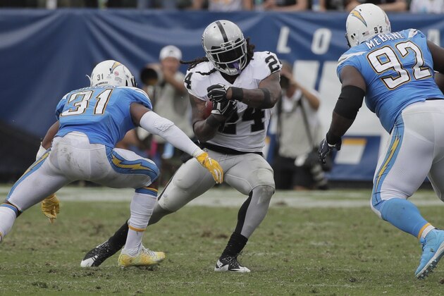 Oakland Raiders running back Marshawn Lynch carries during the second half of an NFL football game against the Los Angeles Chargers Sunday, Oct. 7, 2018, in Carson, Calif. (AP Photo/Jae C. Hong)