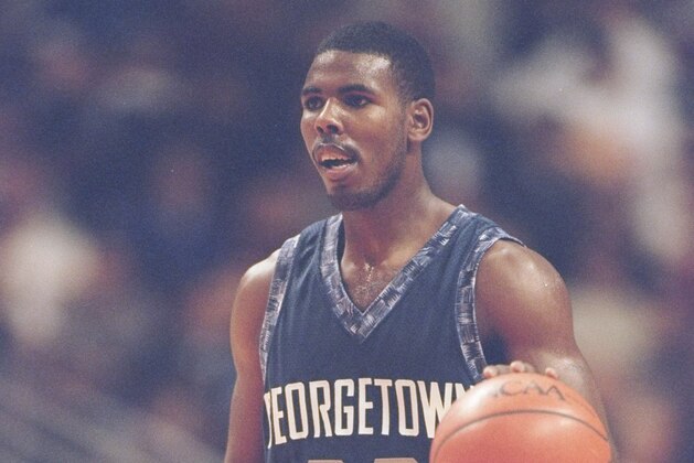 4 Dec 1996:  Guard Victor Page of the Georgetown Hoyas dribbles the ball down the court during a playoff game against the Massachusetts Minutemen at the United Center in Chicago, Illinois.  Georgetown won the game 58-53. Mandatory Credit: Jonathan Daniel  /Allsport