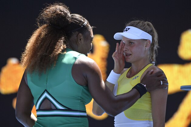United States' Serena Williams, left, consoles Ukraine's Dayana Yastremska after winning their third round match at the Australian Open tennis championships in Melbourne, Australia, Saturday, Jan. 19, 2019. (AP Photo/Andy Brownbill)