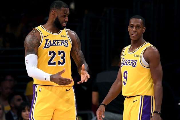 LOS ANGELES, CA - OCTOBER 20:  LeBron James #23 and Rajon Rondo #9 of the Los Angeles Lakers talk during a 124-115 loss to the Houston Rockets at Staples Center on October 20, 2018 in Los Angeles, California.  (Photo by Harry How/Getty Images)