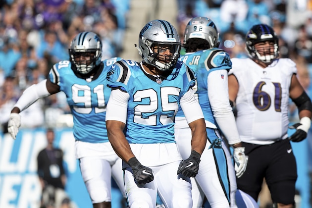 Carolina Panthers' Eric Reid (25) reacts after making a stop during an NFL football game against the Baltimore Ravens in Charlotte, N.C., Sunday, Oct. 28, 2018. (AP Photo/Ben McKeown)