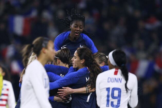 France's players celebrate after their forward Kadidiatou Diani (hidden) scored a goal  during a women's friendly football match between France and USA at the Oceane Stadium in Le Havre, northwestern France, on January 19, 2019. (Photo by CHARLY TRIBALLEAU / AFP)        (Photo credit should read CHARLY TRIBALLEAU/AFP/Getty Images)