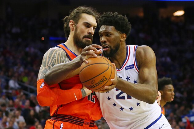 PHILADELPHIA, PA - JANUARY 19: Joel Embiid #21 of the Philadelphia 76ers drives to the basket as Steven Adams #12 of the Oklahoma City Thunder defends during the first half of a game at Wells Fargo Center on January 19, 2019 in Philadelphia, Pennsylvania. (Photo by Rich Schultz/Getty Images)