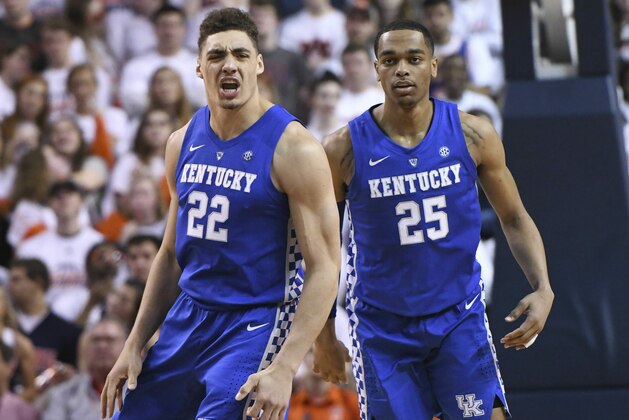Kentucky forward Reid Travis (22) celebrates a score over Auburn during the first half of an NCAA college basketball game Saturday, Jan. 19, 2019, in Auburn, Ala. (AP Photo/Julie Bennett)
