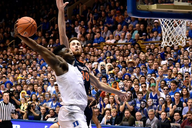 DURHAM, NORTH CAROLINA - JANUARY 19: Zion Williamson #1 of the Duke Blue Devils dunis over Jay Huff #30 of the Virginia Cavaliers during their game at Cameron Indoor Stadium on January 19, 2019 in Durham, North Carolina. Duke won 72-70. (Photo by Grant Halverson/Getty Images) DURHAM, NORTH CAROLINA - JANUARY 19: Zion Williamson #1 of the Duke Blue Devils dunis over Jay Huff #30 of the Virginia Cavaliers during their game at Cameron Indoor Stadium on January 19, 2019 in Durham, North Carolina. Duke won 72-70. (Photo by Grant Halverson/Getty Images)