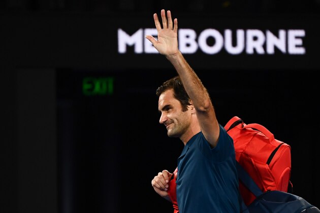Switzerland's Roger Federer waves to the crowd as he leaves the court after his defeat against Greece's Stefanos Tsitsipas during their men's singles match on day seven of the Australian Open tennis tournament in Melbourne on January 20, 2019. (Photo by Jewel SAMAD / AFP) / -- IMAGE RESTRICTED TO EDITORIAL USE - STRICTLY NO COMMERCIAL USE --        (Photo credit should read JEWEL SAMAD/AFP/Getty Images)
