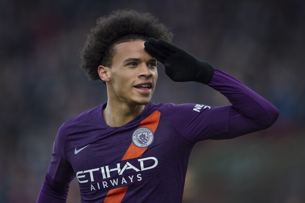 HUDDERSFIELD, ENGLAND - JANUARY 20: Leroy Sane of Manchester City celebrates scoring the third goal during the Premier League match between Huddersfield Town and Manchester City at John Smith's Stadium on January 20, 2019 in Huddersfield, United Kingdom. (Photo by Visionhaus/Getty Images)