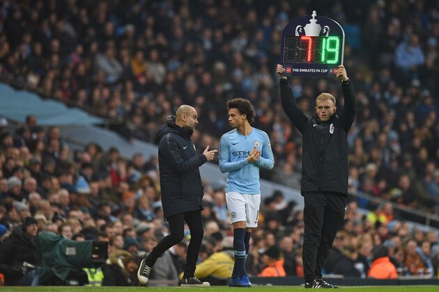 Manchester City's Spanish manager Pep Guardiola (L) talks with Manchester City's German midfielder Leroy Sane as he comes on as substitute during the English FA Cup third round football match between Manchester City and Rotherham United at the Etihad Stadium in Manchester, north west England, on January 6, 2019. (Photo by Oli SCARFF / AFP) / RESTRICTED TO EDITORIAL USE. No use with unauthorized audio, video, data, fixture lists, club/league logos or 'live' services. Online in-match use limited to 120 images. An additional 40 images may be used in extra time. No video emulation. Social media in-match use limited to 120 images. An additional 40 images may be used in extra time. No use in betting publications, games or single club/league/player publications. / (Photo credit should read OLI SCARFF/AFP/Getty Images) Manchester City's Spanish manager Pep Guardiola (L) talks with Manchester City's German midfielder Leroy Sane as he comes on as substitute during the English FA Cup third round football match between Manchester City and Rotherham United at the Etihad Stadium in Manchester, north west England, on January 6, 2019. (Photo by Oli SCARFF / AFP) / RESTRICTED TO EDITORIAL USE. No use with unauthorized audio, video, data, fixture lists, club/league logos or 'live' services. Online in-match use limited to 120 images. An additional 40 images may be used in extra time. No video emulation. Social media in-match use limited to 120 images. An additional 40 images may be used in extra time. No use in betting publications, games or single club/league/player publications. / (Photo credit should read OLI SCARFF/AFP/Getty Images)