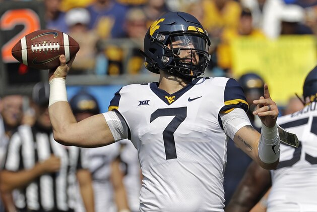 FILE - In this Sept. 1, 2018 file photo, West Virginia's Will Grier (7) looks to pass against Tennessee in the first half of an NCAA college football game in Charlotte, N.C. Oklahoma's Kyler Murray, West Virginia's Will Grier, Iowa State's Brock Purdy and Sam Ehlinger of Texas have been impressive and could determine which teams makes it to the Dec. 1 title game in Arlington, Texas. (AP Photo/Chuck Burton, File)