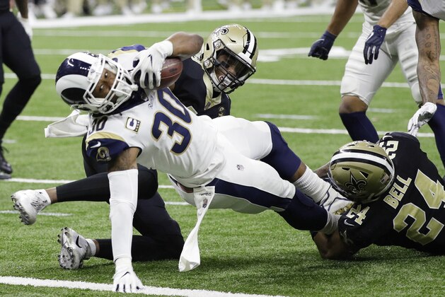 Los Angeles Rams' Todd Gurley dives into the end zone for a touchdown during the first half the NFL football NFC championship game against the New Orleans Saints, Sunday, Jan. 20, 2019, in New Orleans. (AP Photo/David J. Phillip)
