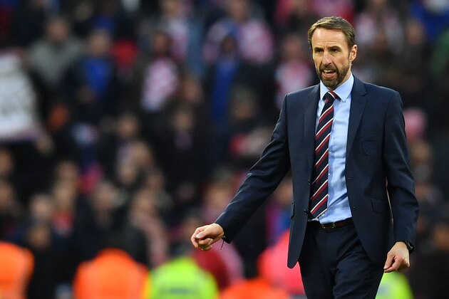 England's manager Gareth Southgate celebrates on the pitch after the international UEFA Nations League football match between England and Croatia at Wembley Stadium in London on November 18, 2018. - England beat Croatia 2-1 to qualify for the Nations League semi-finals. (Photo by Ben STANSALL / AFP) / NOT FOR MARKETING OR ADVERTISING USE / RESTRICTED TO EDITORIAL USE        (Photo credit should read BEN STANSALL/AFP/Getty Images)