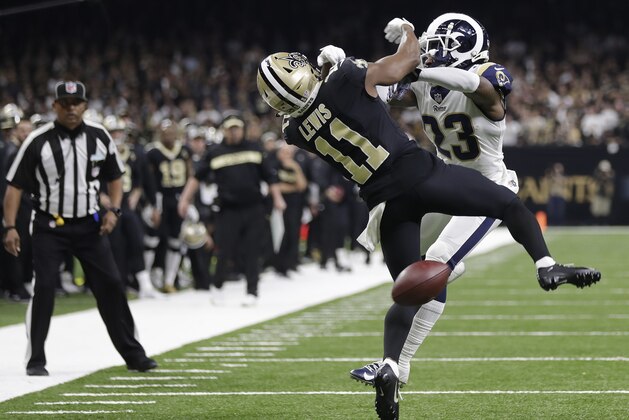 New Orleans Saints wide receiver Tommylee Lewis (11) works for a coach against Los Angeles Rams defensive back Nickell Robey-Coleman (23) during the second half the NFL football NFC championship game Sunday, Jan. 20, 2019, in New Orleans. The Rams won 26-23. (AP Photo/Gerald Herbert)