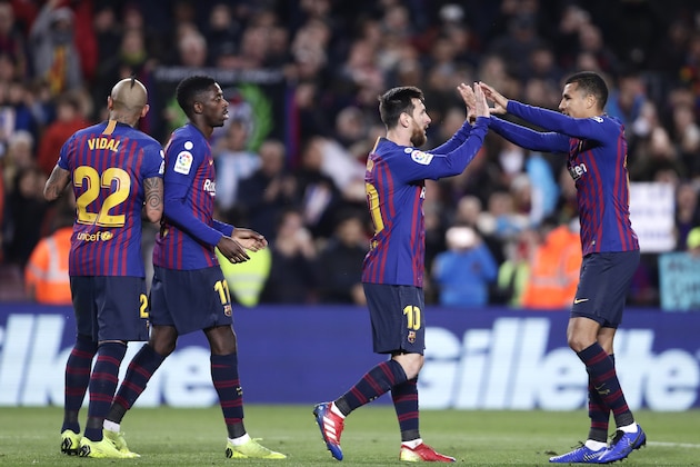 FC Barcelona's Lionel Messi, second from right, celebrates after scoring his side's third goal during a Spanish Copa del Rey soccer match between FC Barcelona and Levante at the Camp Nou stadium in Barcelona, Spain, Thursday, Jan. 17, 2019. (AP Photo/Manu Fernandez)