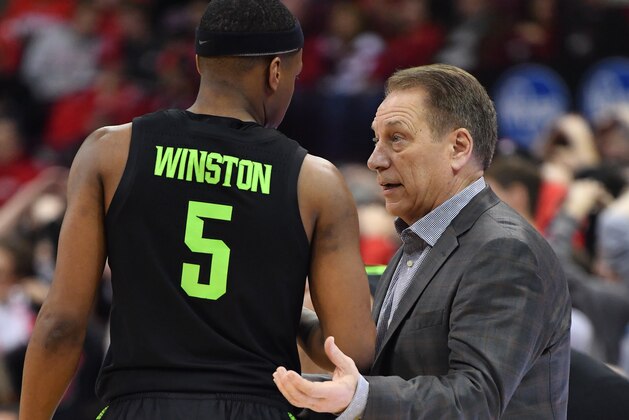 COLUMBUS, OH - JANUARY 5:  Head Coach Tom Izzo of the Michigan State Spartans talks to Cassius Winston #5 of the Michigan State Spartans during a game against the Ohio State Buckeyes on January 5, 2019 at Value City Arena in Columbus, Ohio.  (Photo by Jamie Sabau/Getty Images)