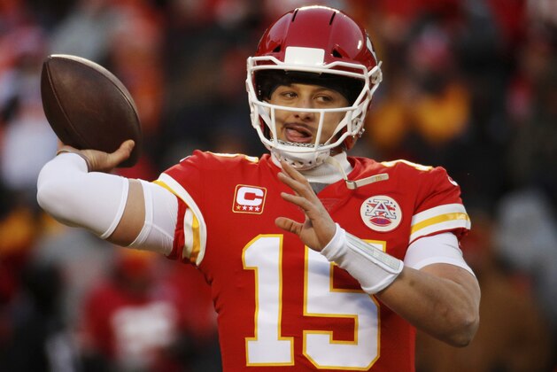 Kansas City Chiefs quarterback Patrick Mahomes warms up before the AFC Championship NFL football game against the New England Patriots, Sunday, Jan. 20, 2019, in Kansas City, Mo. (AP Photo/Charlie Riedel)