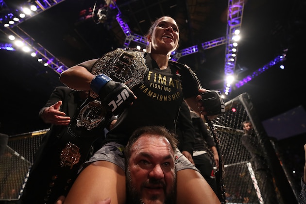 INGLEWOOD, CA - DECEMBER 29:  Amanda Nunes of Brazil celebrates after defeating Cris Cyborg of Brazil in their women's featherweight bout during the UFC 232 event inside The Forum on December 29, 2018 in Inglewood, California. (Photo by Christian Petersen/Zuffa LLC/Zuffa LLC via Getty Images)