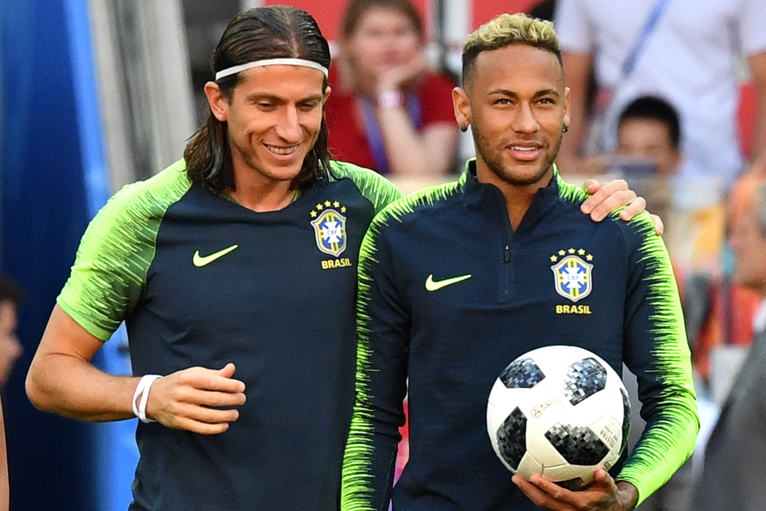 Brazil's forward Neymar (R) and Brazil's defender Filipe Luis take part in a training session with teammates at the Luzhniki stadium in Moscow on June 26, 2018, on the eve of the Russia 2018 World Cup Group E football match between Serbia and Brazil. (Photo by Yuri KADOBNOV / AFP)        (Photo credit should read YURI KADOBNOV/AFP/Getty Images)
