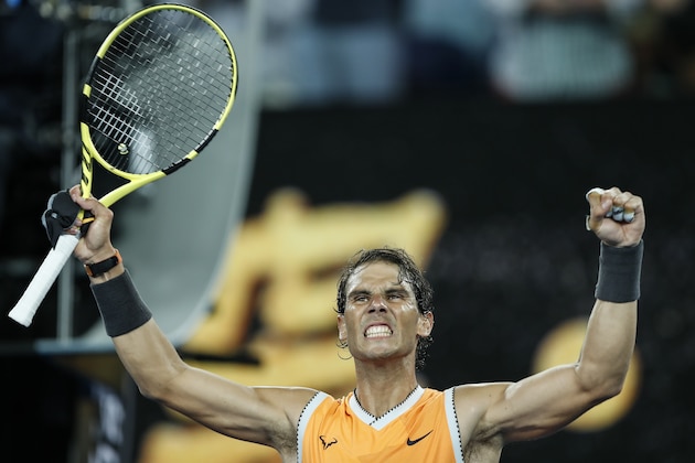 MELBOURNE, AUSTRALIA - JANUARY 22: Rafael Nadal of Spain celebrates winning his quarter final match against Frances Tiafoe of the United States during day nine of the 2019 Australian Open at Melbourne Park on January 22, 2019 in Melbourne, Australia. (Photo by Fred Lee/Getty Images)
