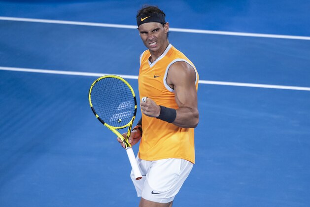 MELBOURNE, AUSTRALIA - JANUARY 22: Rafael Nadal of Spain celebrates beating Frances Tiafoe of the United States during day nine of the 2019 Australian Open at Melbourne Park on January 22, 2019 in Melbourne, Australia. (Photo by TPN/Getty Images)