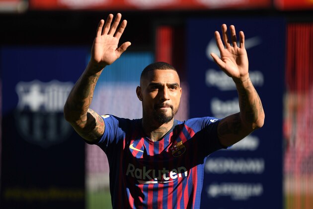 BARCELONA, SPAIN - JANUARY 22: New Barcelona signing Kevin-Prince Boateng waves to fans as he is unveiled at Nou Camp on January 22, 2019 in Barcelona, Spain. (Photo by David Ramos/Getty Images)