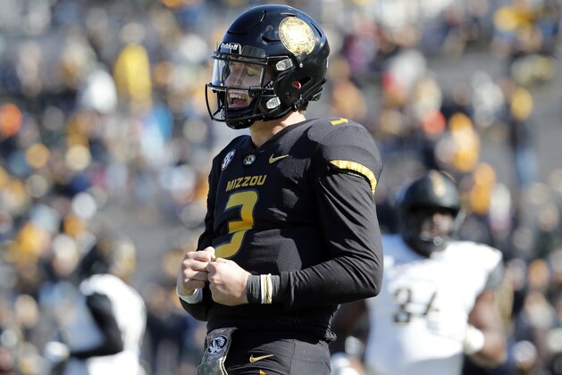 Missouri quarterback Drew Lock reacts after throwing an incomplete pass during the first half of an NCAA college football game against Vanderbilt Saturday, Nov. 10, 2018, in Columbia, Mo. (AP Photo/Jeff Roberson)