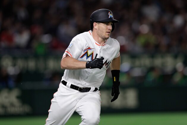 TOKYO, JAPAN - NOVEMBER 10:  Catcher J.T. Realmuto #11 of the Miami Marlins hits a double in the bottom of 7th inning during the game two of the Japan and MLB All Stars at Tokyo Dome on November 10, 2018 in Tokyo, Japan.  (Photo by Kiyoshi Ota/Getty Images)