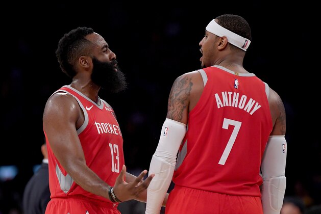 LOS ANGELES, CA - OCTOBER 20:  James Harden #13 of the Houston Rockets and Carmelo Anthony #7 of the Houston Rockets talk during a break in the game against the Los Angeles Lakers at Staples Center on October 20, 2018 in Los Angeles, California.  (Photo by Harry How/Getty Images)