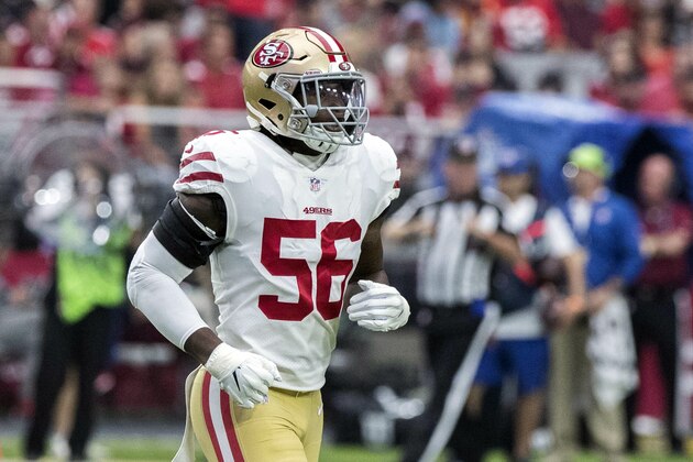 FILE - In this Oct. 28, 2018, file photo, San Francisco 49ers' Reuben Foster (56) jogs on the field during the first half of an NFL football game against the Arizona Cardinals in Glendale, Ariz. Foster’s ex-girlfriend tells ABC’s “Good Morning America” that he slapped her and pushed her during an incident in Tampa, Fla., that led to his arrest for domestic violence. Elissa Ennis says in an interview televised Thursday, Dec. 6, 3028, that Foster abused her three times, most recently last month in Tampa. (AP Photo/Darryl Webb, File)