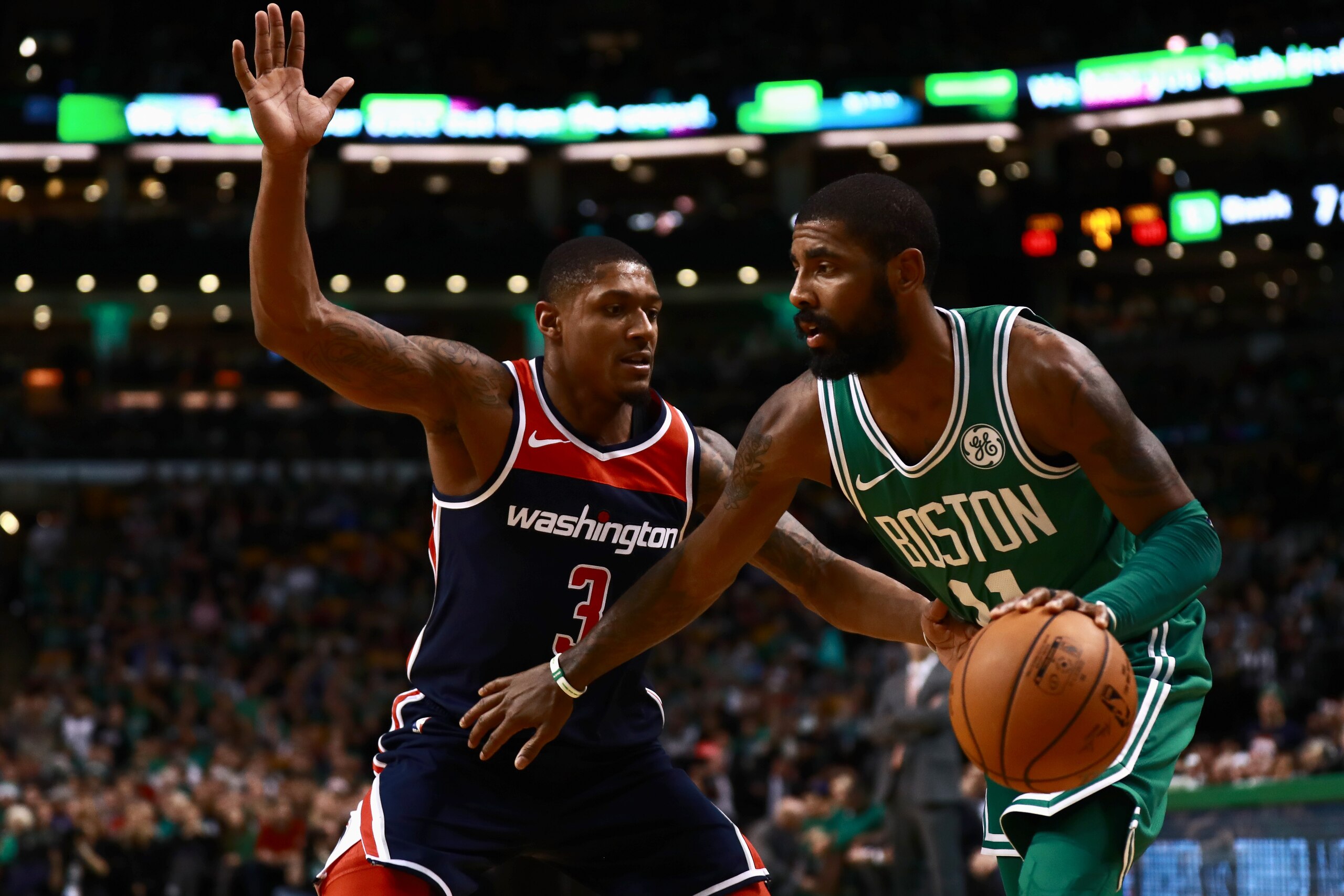 BOSTON, MA - DECEMBER 25: Kyrie Irving #11 of the Boston Celtics drives to the basket Bradley Beal #3 of the Washington Wizards during the game at TD Garden on December 25, 2017 in Boston, Massachusetts. NOTE TO USER: User expressly acknowledges and agrees that, by downloading and or using this photograph, User is consenting to the terms and conditions of the Getty Images License Agreement. (Photo by Omar Rawlings/Getty Images) BOSTON, MA - DECEMBER 25: Kyrie Irving #11 of the Boston Celtics drives to the basket Bradley Beal #3 of the Washington Wizards during the game at TD Garden on December 25, 2017 in Boston, Massachusetts. NOTE TO USER: User expressly acknowledges and agrees that, by downloading and or using this photograph, User is consenting to the terms and conditions of the Getty Images License Agreement. (Photo by Omar Rawlings/Getty Images)