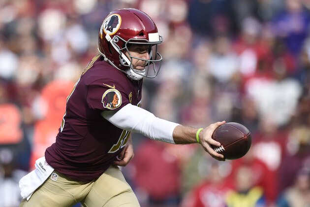 LANDOVER, MD - NOVEMBER 18: Alex Smith #11 of the Washington Redskins hands the ball off in the first half against the Houston Texans at FedExField on November 18, 2018 in Landover, Maryland. (Photo by Patrick McDermott/Getty Images)
