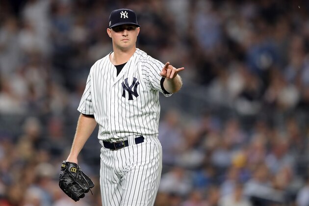 NEW YORK, NEW YORK - OCTOBER 09:  Zach Britton #53 of the New York Yankees reacts in the fourth inning against the Boston Red Sox during Game Four American League Division Series at Yankee Stadium on October 09, 2018 in the Bronx borough of New York City. (Photo by Elsa/Getty Images)