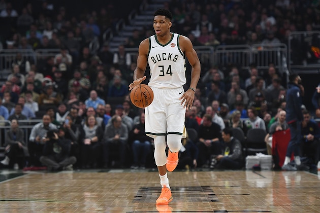 MILWAUKEE, WISCONSIN - DECEMBER 19:  Giannis Antetokounmpo #34 of the Milwaukee Bucks handles the ball during a game against the New Orleans Pelicans at Fiserv Forum on December 19, 2018 in Milwaukee, Wisconsin.  NOTE TO USER: User expressly acknowledges and agrees that, by downloading and or using this photograph, User is consenting to the terms and conditions of the Getty Images License Agreement. (Photo by Stacy Revere/Getty Images)