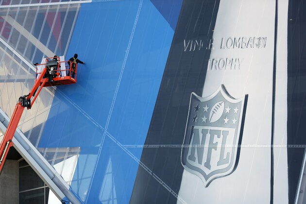 Workers hang banners on Mercedes-Benz Stadium in preparation for the NFL Super Bowl football game, Thursday, Jan. 10, 2019, in Atlanta. (AP Photo/John Bazemore) Workers hang banners on Mercedes-Benz Stadium in preparation for the NFL Super Bowl football game, Thursday, Jan. 10, 2019, in Atlanta. (AP Photo/John Bazemore)