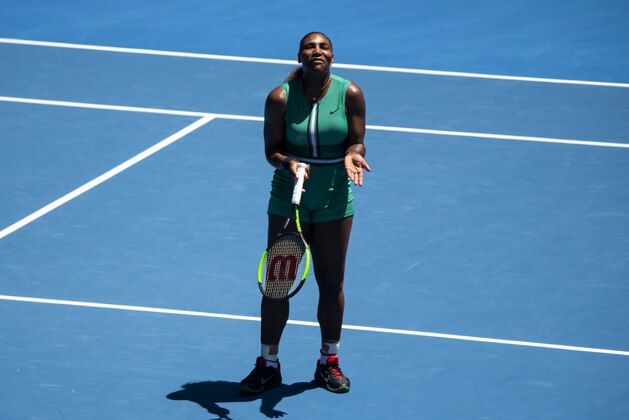 MELBOURNE, AUSTRALIA - JANUARY 23: Serena Williams of the United States shows her frustration against Karolina Pliskova of the Czech Republic during day 10 of the 2019 Australian Open at Melbourne Park on January 23, 2019 in Melbourne, Australia. (Photo by TPN/Getty Images)