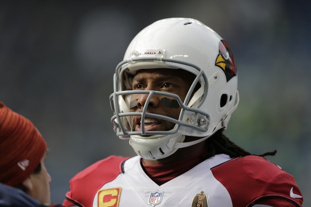 Arizona Cardinals' Larry Fitzgerald warms-up before the first half of an NFL football game against the Seattle Seahawks, Sunday, Dec. 30, 2018, in Seattle. (AP Photo/John Froschauer)