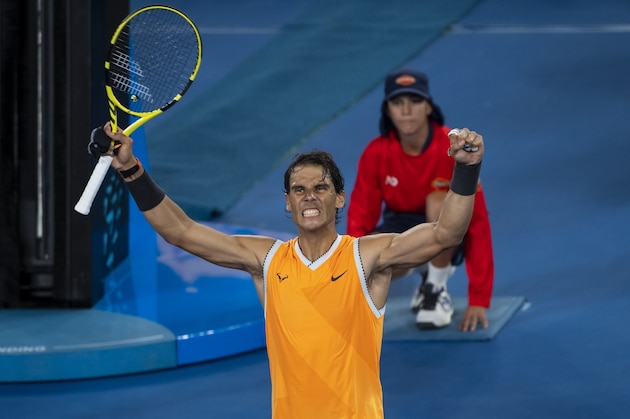 MELBOURNE, AUSTRALIA - JANUARY 22: Rafael Nadal of Spain celebrates beating Frances Tiafoe of the United States during day nine of the 2019 Australian Open at Melbourne Park on January 22, 2019 in Melbourne, Australia. (Photo by TPN/Getty Images)