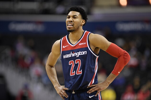 Washington Wizards forward Otto Porter Jr. (22) reacts during the first half of an NBA basketball game against the Toronto Raptors, Sunday, Jan. 13, 2019, in Washington. (AP Photo/Nick Wass)