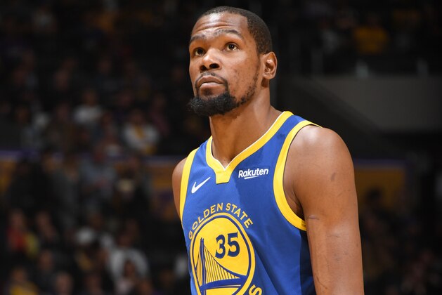 LOS ANGELES, CA - JANUARY 21: Kevin Durant #35 of the Golden State Warriors looks on during the game against the Los Angeles Lakers on January 21, 2019 at STAPLES Center in Los Angeles, California. NOTE TO USER: User expressly acknowledges and agrees that, by downloading and/or using this Photograph, user is consenting to the terms and conditions of the Getty Images License Agreement. Mandatory Copyright Notice: Copyright 2019 NBAE (Photo by Andrew D. Bernstein/NBAE via Getty Images)