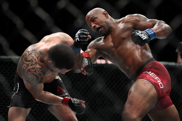 CHICAGO, IL - JUNE 09:  Yoel Romero of Cuba (L) attempts a punch against Robert Whittaker of New Zealand in the third round in their middleweight title fight during the UFC 225: Whittaker v Romero 2 event at the United Center on June 9, 2018 in Chicago, Illinois. Whittaker won in a split decision.  (Photo by Dylan Buell/Getty Images)
