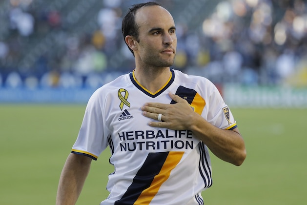 FILE - In this Sept. 11, 2016, file photo, Los Angeles Galaxy's Landon Donovan acknowledges fans after the team's MLS soccer match against Orlando City in Carson, Calif. Donovan says he is not ready to decide whether he will extend his MLS comeback for another season following the Galaxy’s elimination from the playoffs. The Galaxy also had no news Wednesday, Nov. 9, on the career plans of Steven Gerrard and Robbie Keane. (AP Photo/Jae C. Hong. File)