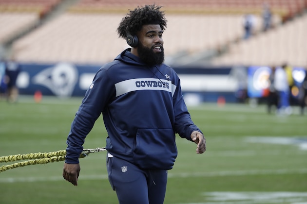 Dallas Cowboys running back Ezekiel Elliott warms up before an NFL divisional football playoff game against the Los Angeles Rams Saturday, Jan. 12, 2019, in Los Angeles. (AP Photo/Marcio Jose Sanchez)