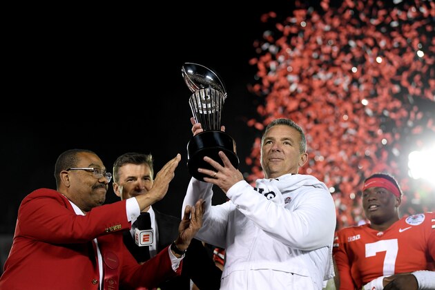PASADENA, CA - JANUARY 01: Ohio State Buckeyes head coach Urban Meyer with the Rose Bowl trophy celebrates winning the Rose Bowl Game presented by Northwestern Mutual at the Rose Bowl on January 1, 2019 in Pasadena, California. (Photo by Harry How/Getty Images) PASADENA, CA - JANUARY 01: Ohio State Buckeyes head coach Urban Meyer with the Rose Bowl trophy celebrates winning the Rose Bowl Game presented by Northwestern Mutual at the Rose Bowl on January 1, 2019 in Pasadena, California. (Photo by Harry How/Getty Images)