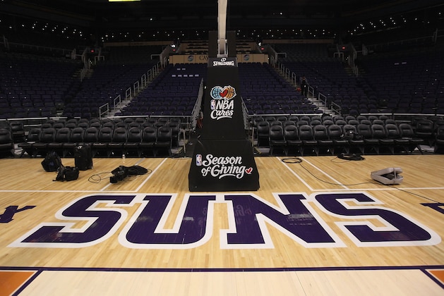 PHOENIX - DECEMBER 11:  The Phoenix Suns logo is seen on the court before the NBA game against the Orlando Magic at US Airways Center on December 11, 2009 in Phoenix, Arizona. The Suns defeated the Magic 106-103.  NOTE TO USER: User expressly acknowledges and agrees that, by downloading and or using this photograph, User is consenting to the terms and conditions of the Getty Images License Agreement.  (Photo by Christian Petersen/Getty Images)