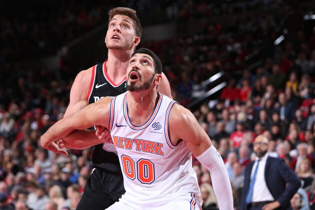 PORTLAND, OR - JANUARY 7:  Enes Kanter #00 of the New York Knicks boxes out against Meyers Leonard #11 of the Portland Trail Blazers on January 7, 2019 at the Moda Center Arena in Portland, Oregon. NOTE TO USER: User expressly acknowledges and agrees that, by downloading and or using this photograph, user is consenting to the terms and conditions of the Getty Images License Agreement. Mandatory Copyright Notice: Copyright 2019 NBAE (Photo by Sam Forencich/NBAE via Getty Images)