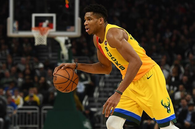 MILWAUKEE, WISCONSIN - JANUARY 21:  Giannis Antetokounmpo #34 of the Milwaukee Bucks handles the ball during a game against the Dallas Mavericks at Fiserv Forum on January 21, 2019 in Milwaukee, Wisconsin. NOTE TO USER: User expressly acknowledges and agrees that, by downloading and or using this photograph, User is consenting to the terms and conditions of the Getty Images License Agreement. (Photo by Stacy Revere/Getty Images)