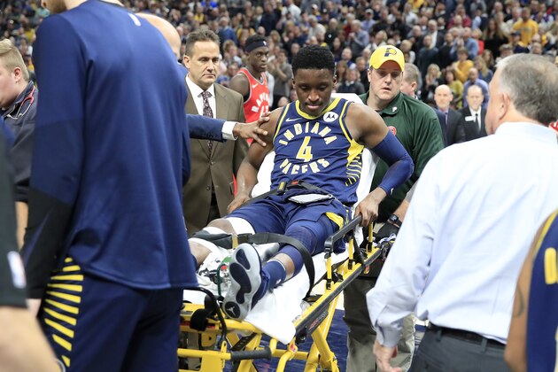 INDIANAPOLIS, INDIANA - JANUARY 23:  Victor Oladipo #4  of the Indiana Pacers is taken off of the court on a stretcher after being injured in the second quarter of the game against the Toronto Raptors  at Bankers Life Fieldhouse on January 23, 2019 in Indianapolis, Indiana. (Photo by Andy Lyons/Getty Images)