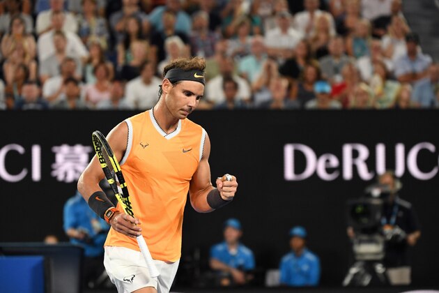 Spain's Rafael Nadal reacts after a point against Greece's Stefanos Tsitsipas during their men's singles semi-final match on day 11 of the Australian Open tennis tournament in Melbourne on January 24, 2019. (Photo by Saeed KHAN / AFP) / -- IMAGE RESTRICTED TO EDITORIAL USE - STRICTLY NO COMMERCIAL USE --        (Photo credit should read SAEED KHAN/AFP/Getty Images)